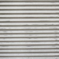 表面の擦れたシャッターのテクスチャの写真
