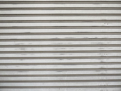 表面の擦れたシャッターのテクスチャ