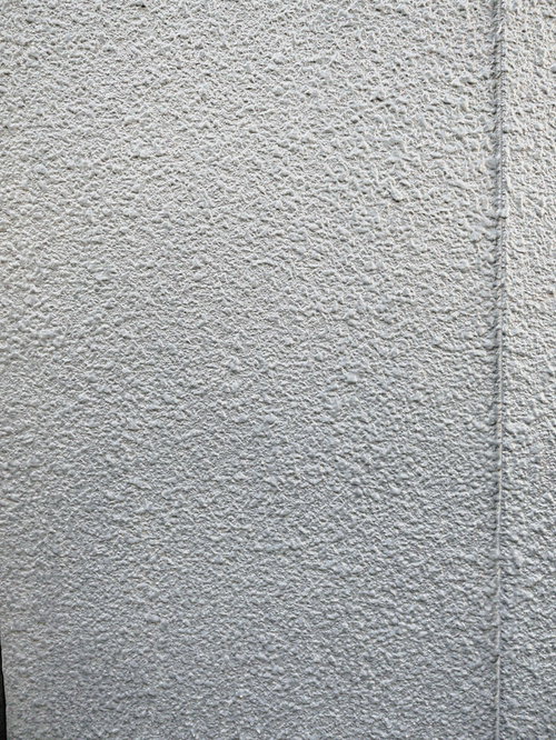 継ぎ目のあるグレーのモルタル壁テクスチャ