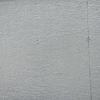 グレーに塗装された内壁のコンクリートテクスチャーの写真