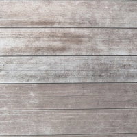 経年劣化で色褪せてきた板壁の木目テクスチャーの写真