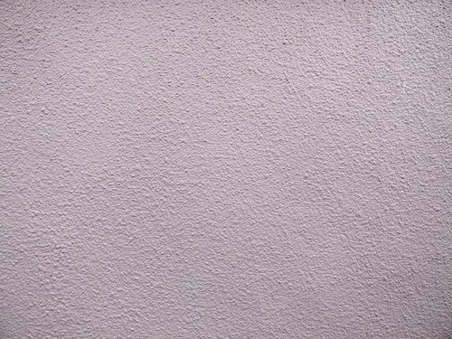 モルタルで仕上がった外壁の細かい凹凸テクスチャ