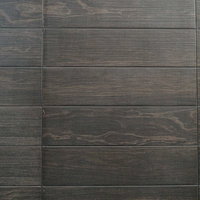 ダークブラウンの木目調タイル壁のテクスチャーの写真
