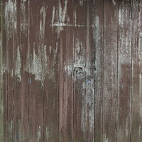 ペンキ剥げした板戸の古い木目テクスチャーの写真