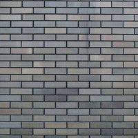 目地の深いグレーのレンガ調外壁のテクスチャーの写真