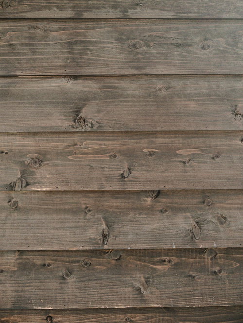 節跡が目立つ縦張り板壁のテクスチャー
