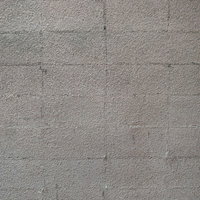 グレーのコンクリートブロック塀のテクスチャーの写真