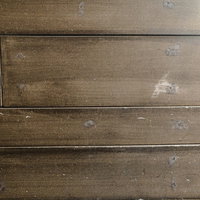 補修跡残る古い板の間のテクスチャの写真