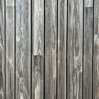 風化して白く浮かび上がる木目のウッドフェンステクスチャーの写真