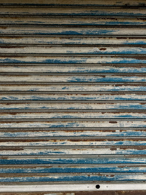 ペンキ剥げの鎧戸のテクスチャー