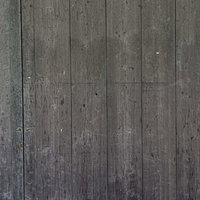 歴史を感じる古材の板壁テクスチャーの写真
