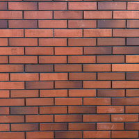 赤茶色のレンガタイル壁のテクスチャーの写真