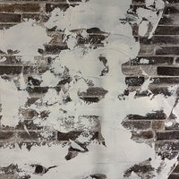 ペンキが剥がれた古い煉瓦壁のテクスチャーの写真