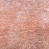 靴跡と汚れが付いたベニヤ板のテクスチャーの写真