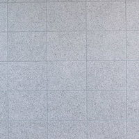 敷き詰められた真新しいグレー石材タイルのテクスチャーの写真