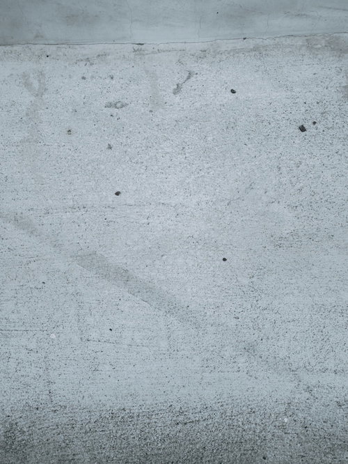 地下のコンクリートの壁面 グレー系の無機質テクスチャー