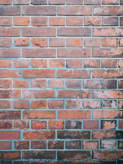 古いレンガの壁のテクスチャ素材 赤茶色の積み重ねられた風合い