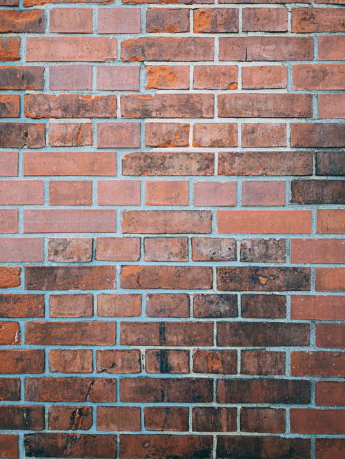 古くて経年劣化したレンガの壁テクスチャー