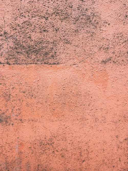 汚れとヒビ割れが付着したコンクリート壁のテクスチャー