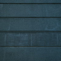 濃いグレーに塗装された横板家壁のテクスチャーの写真