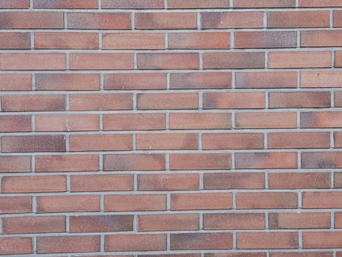 屋外のレンガ風タイルの壁面テクスチャー