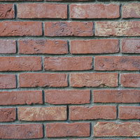 劣化したレンガの壁のテクスチャーの写真