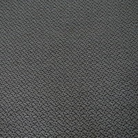 グレーのきめ細かい絨毯の縦断テクスチャーの写真