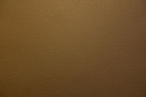 ざらついた質感の茶色い布地のテクスチャー