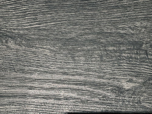 荒い木目のテクスチャーを持つグレーの木材
