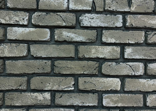 グレーがかった茶色のレンガタイルの壁の横積み目地パターン