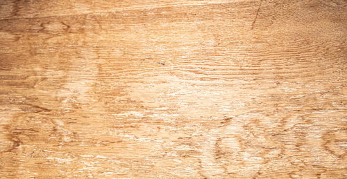 色あせた木目板のテクスチャー、古材の風化した風情