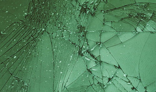 割れたガラスフィルムのテクスチャー 放射状クラック破損パターン