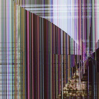 カラフルなノイズが表示された液晶ディスプレイの損傷状態の写真