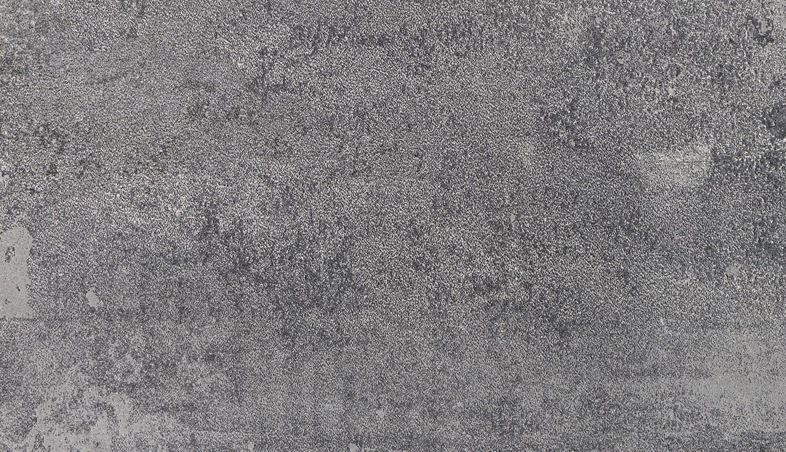 グレーの粗いコンクリート壁全体に細かい粒状のノイズテクスチャーが広がっている