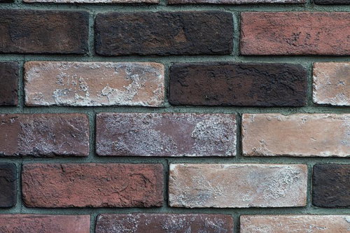 色褪せたレンガ壁の古いテクスチャー