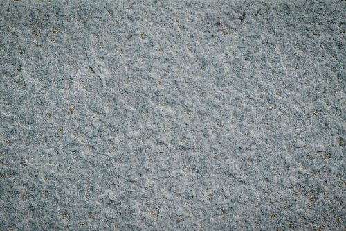 うっすらと土が被ったグレーの石材テクスチャー