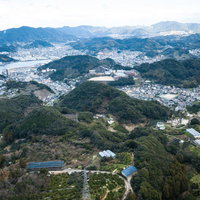 鳴鼓岳からの景観、時津町の住宅街を空撮で見下ろすの写真