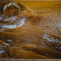 徳之島の緑の断崖と海岸線の眺めの写真