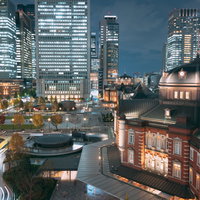 東京駅丸の内駅舎を見下ろす高層ビル群の夜景の写真