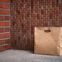 フードデリバリーの置き配で忘れられた紙袋の写真