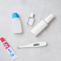 家庭用医療キットに揃えておきたい常備薬と体温計の写真