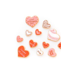 ドキドキ！バレンタインクッキー、ピンク×オレンジのアイシング詰め合わせの写真