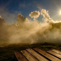 白馬山荘テラスから望む北アルプスの夕日と雲海の写真