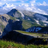 白馬岳山頂から望む白馬連峰の写真