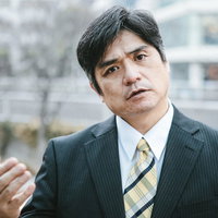 釣り上げたさかなの話が止まらない取引先の部長の写真