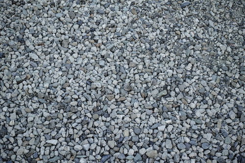 砂利道のテクスチャーと小石の地面