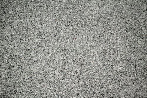 細かい砂利が混じったアスファルトの地面（テクスチャ）