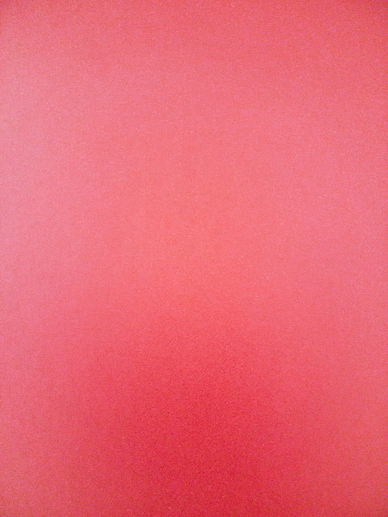 上から下にかけて濃淡が変化する赤いグラデーション