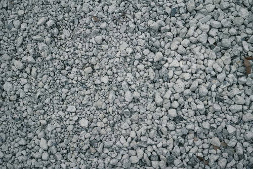 びっしり敷き詰められたいびつな小石の地面テクスチャー