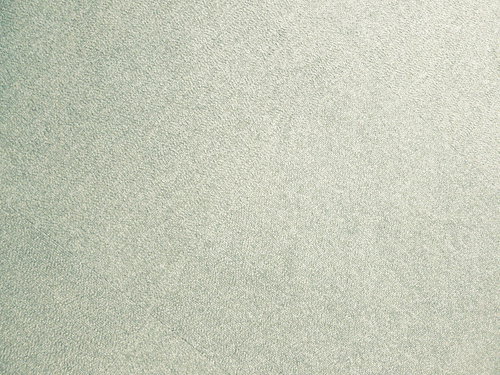 グレーのタイルカーペットのテクスチャー